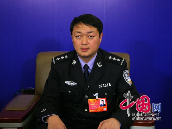 周俊军:建议建立跟社会发展相适应的民警增长机制