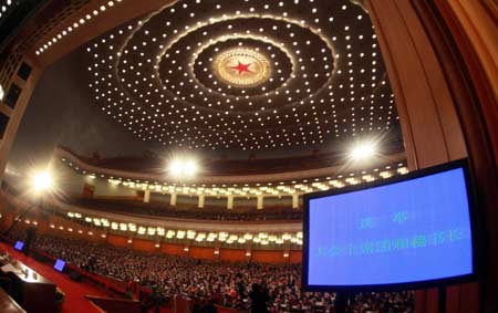Deputies to the 11th National People's Congress (NPC) gathered in Beijing Tuesday morning to elect a presidium and set the agenda for the landmark legislative session to begin on Wednesday.