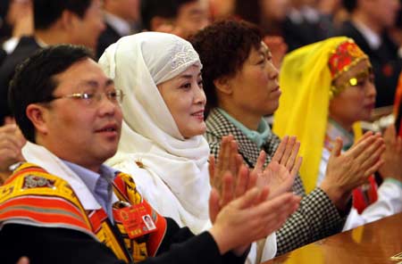 Deputies to the 11th National People's Congress (NPC) gathered in Beijing Tuesday morning to elect a presidium and set the agenda for the landmark legislative session to begin on Wednesday.