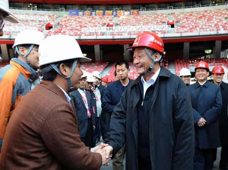 China's top legislator Wu Bangguo has urged the Beijing municipal government to make good preparations for the upcoming Olympic Games to ensure it will be unique and successful.