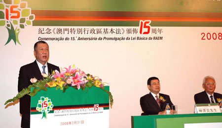 Edmund Ho Hau Wah (L), chief executive of China's Macao Special Administrative Region (SAR), speaks at a proseminar commemorating the 15th anniversary of Macao SAR Basic Law promulgation in Macao, south China, March 31, 2008.