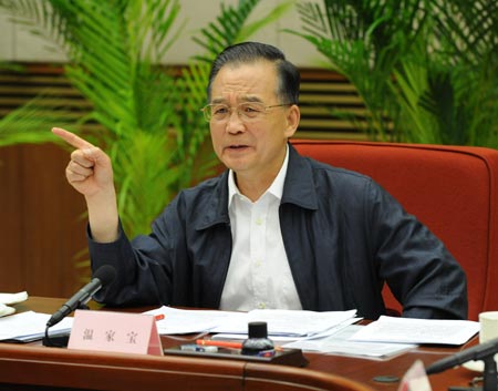 Chinese Premier Wen Jiabao presides over the 10th meeting of the general headquarters of quake relief under the State Council in Beijing, capital of China, May 19, 2008.