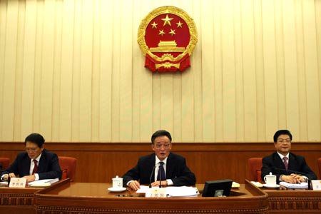 China's top legislature closed its five-day bimonthly session on Sunday, approving a nomination of the country's new minister of public security and adopting four law bills.