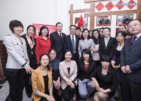 Wu Bangguo (5th L back), chairman of the Standing Committee of the National People's Congress of China, poses for a group photo with teachers during his visit to the Confucius Institute at Russian Far Eastern Federal University in Vladivostok, Russia, Jan. 29, 2013.(Xinhua/Wang Ye) 