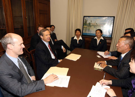 Shingtsa Tenzinchodrak (R), a living Buddha of the Kagyu sect of the Tibetan Buddhism and vice chairman of the Standing Committee of the People's Congress of Tibet Autonomous Region of China, meets with Mark Kirk (L2) and Rick Larsen (L1), co-chairmen of the U.S.-China Working Group in the House, in Washington, the United States, March 17, 2009. Mark Kirk and Rick Larsen, co-chairmen of the U.S.-China Working Group, met here on Tuesday with a five-member delegation of Tibetan deputies of China's National People's Congress, led by Shingtsa Tenzinchodrak.