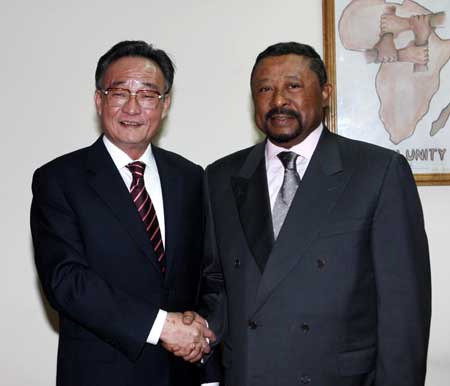 Wu Bangguo (L), chairman of the Standing Committee of China's National People's Congress(NPC), the country's top legislature, shakes hands with Chairman of the African Union Commission Jean Ping in Addis Ababa, capital of Ethiopia, on Nov. 10, 2008.