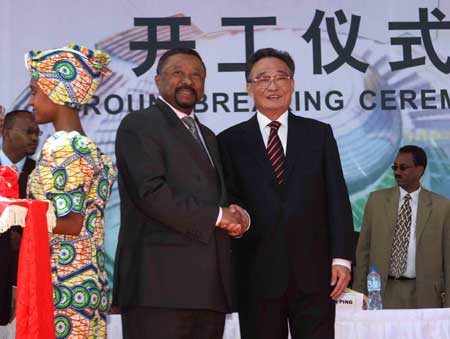  Wu Bangguo (R), chairman of the Standing Committee of China's National People's Congress(NPC), the country's top legislature, shakes hands with Chairman of the African Union Commission Jean Ping at the ground breaking ceremony for the African Union Conference Center aided by Chinese government in Addis Ababa, capital of Ethiopia, on Nov. 10, 2008. 