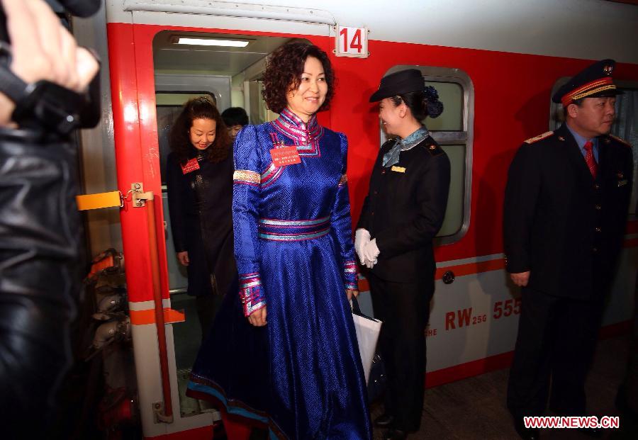 Deputies to the 12th National People's Congress (NPC) from north China's Inner Mongolia Autonomous Region arrive in Beijing, capital of China, March 2, 2014. The second session of 12th NPC, the national legislature, is scheduled to open in Beijing on March 5. (Xinhua/Jin Liwang) 