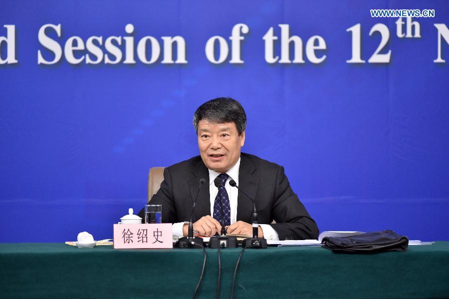 Xu Shaoshi, head of China's National Development and Reform Commission, gives a press conference for the third session of China's 12th National People's Congress (NPC) on the economic situation and macro-economic control in Beijing, capital of China, March 5, 2015. The third session of China's 12th NPC opened in Beijing on March 5. (Xinhua/Li Xin) 