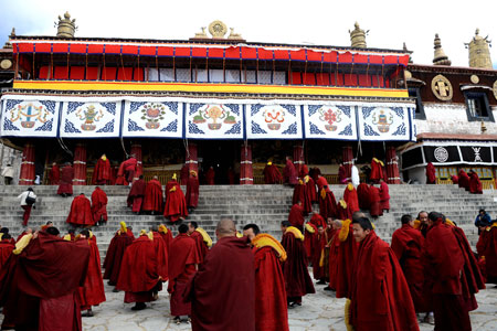 Tibetan Buddhists attend a Buddhist ceremony at the Zhaibung Monastery in the suburb of Lhasa, capital of southwest China's Tibet Autonomous Region, March 4, 2009.