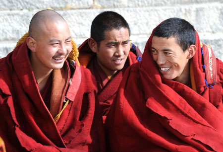 Tibetan Buddhists attend a Buddhist ceremony at the Zhaibung Monastery in the suburb of Lhasa, capital of southwest China's Tibet Autonomous Region, March 4, 2009. 
