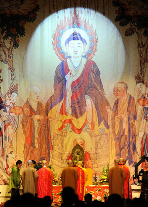 Masters burn incense in the opening ceremony of the Second World Buddhist Forum (WBF) held in Wuxi, east China's Jiangsu Province on March 28, 2009.