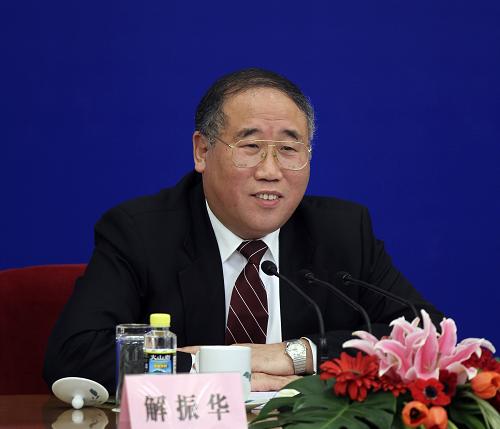 Xie Zhenhua, vice minister of the National Development and Reform Commission, answers questions at the press conference. [Xinhua]