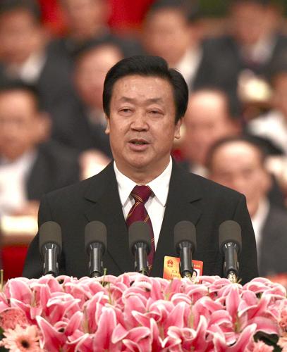 China's top judge Wang Shengjun delivers a report on the work of the Supreme People's Court at a meeting of the annual parliament session Thursday.