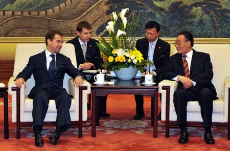 Wu Bangguo (R), chairman of the Standing Committee of China's National People's Congress (NPC), meets with visiting Russian President Dmitry Medvedev (L) in Beijing, China, May 24, 2008.