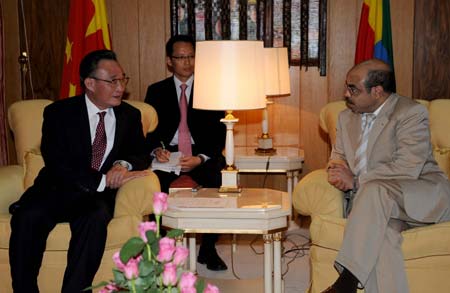 Ethiopian Prime Minister Meles Zenawi(R) talks with Wu Bangguo, chairman of the Standing Committee of China's National People's Congress(NPC), the country's top legislature, during their meeting in Addis Ababa, capital of Ethiopia, Nov. 10, 2008.