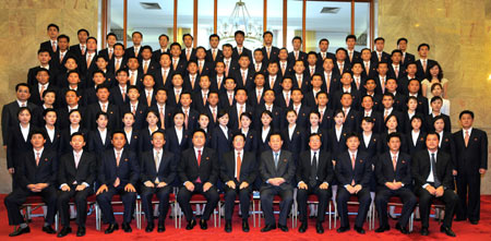Wang Zhaoguo (front row, R6), vice chairman of the Standing Committee of China's National People's Congress, poses for photos with the DPRK youth delegation in Beijing, capital of China, Sept. 22, 2009. Wang Zhaoguo said on Tuesday that China would make joint efforts with the Democratic People's Republic of Korea (DPRK) to push forward bilateral ties on the occasion of the 60th anniversary of the establishment of diplomatic relations between the two countries. (Xinhua/Xie Huanchi) 