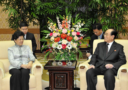 Kim Yong Nam (R), president of the Presidium of the Supreme People's Assembly (SPA) of the Democratic People's Republic of Korea (DPRK), meets with Chen Zhili, vice chairwoman of the Standing Committee of China's National People's Congress (NPC), in Pyongyang, capital of the DPRK, Dec. 3, 2009