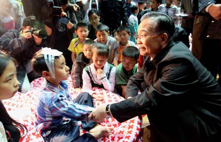 Chinese Premier Wen Jiabao said Tuesday evening that saving lives is still the major task of current relief work against a major quake which jolted southwest China's Sichuan Province on Monday afternoon.
