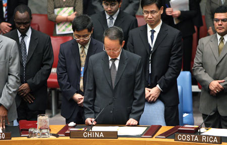China's Permanent Representative to the United Nations Wang Guangya (C Front) and representatives of the UN Security Council members stand in a silent tribute to the Chinese earthquake victims, during a Security Council meeting at the UN headquarters in New York, the United States, May 20, 2008. 
