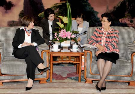 Chairwoman of the All-China Women's Federation (ACWF) Chen Zhili (1st, R), also vice chairperson of the Standing Committee of the National People's Congress, meets with a women's delegation from Macedonia headed by Savka Todorovska (1st, L), president of the national council of women of Macedonia in Beijing, China, Nov. 27, 2008