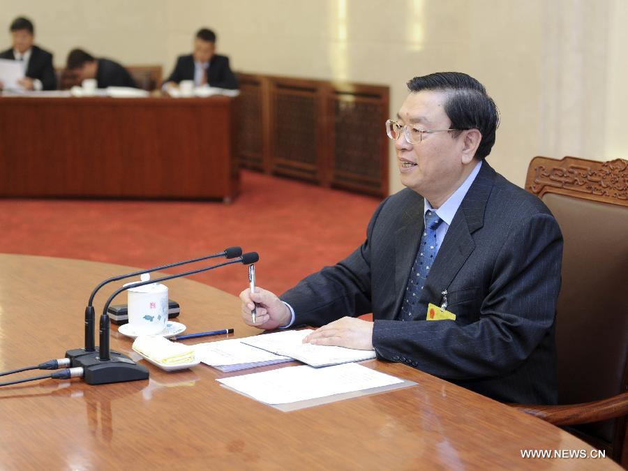 Zhang Dejiang, chairman of China's 12th National People's Congress (NPC) Standing Committee, presides over the 22nd meeting of the chairman and vice chairpersons of the 12th NPC Standing Committee at the Great Hall of the People in Beijing, capital of China, April 23, 2014. (Xinhua/Zhang Duo) 